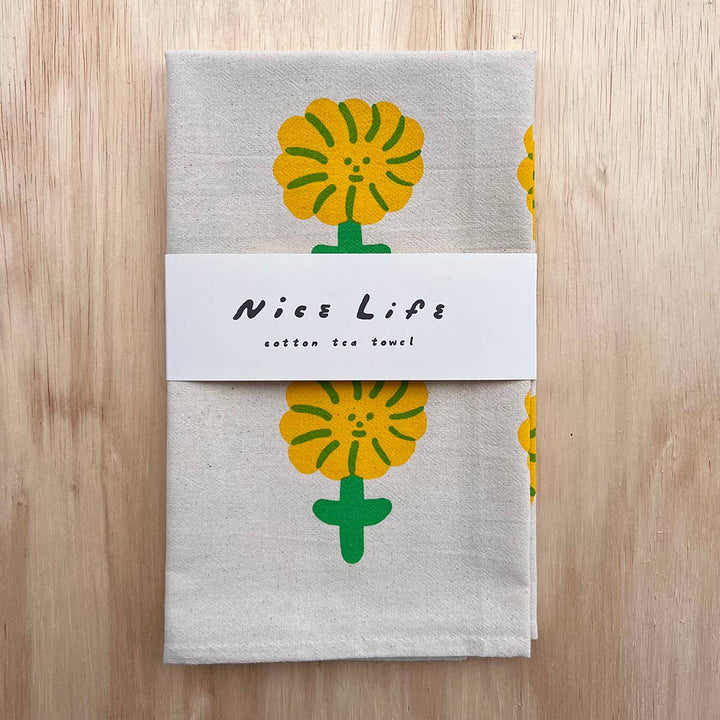 Happy flower tea towel